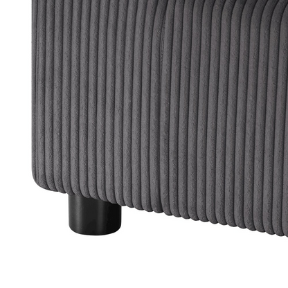Modern Casella armchair by Start2Finish with charcoal corduroy upholstery, featuring a sleek design and comfortable armrests.