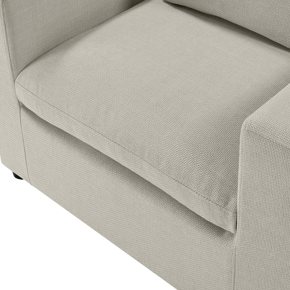 Beige Casella Modern Armchair by Start2Finish with sleek design and cushioned seat, shown from a side angle.
