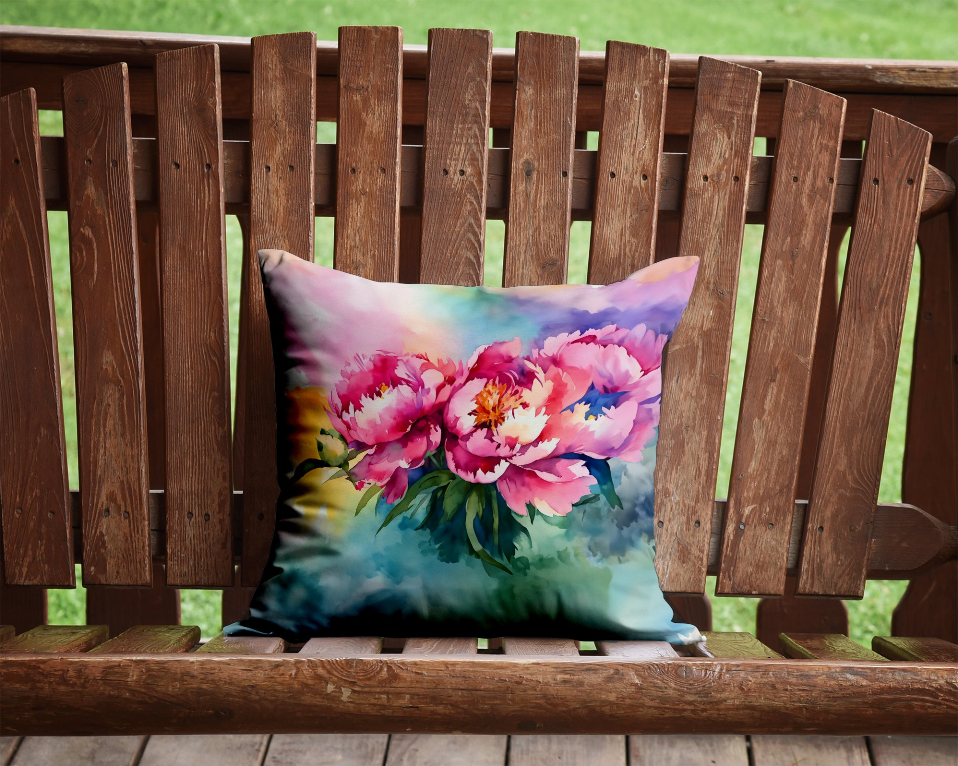 Watercolor peonies on a decorative throw pillow for home decor, featuring soft pink and green floral design.