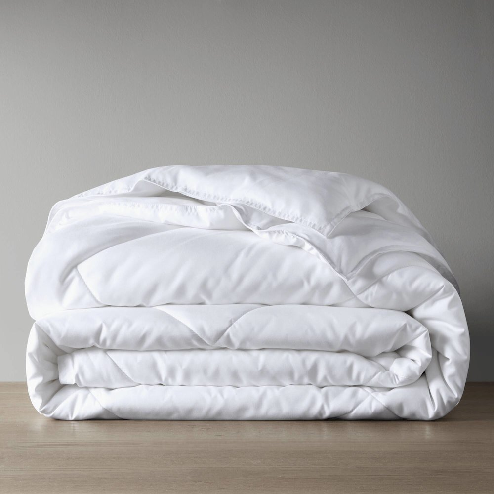 Cooling Touch oversized down alternative comforter in white by Start2Finish, showcasing its plush, breathable design for restful sleep.