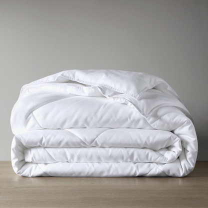 Cooling Touch oversized down alternative comforter in white by Start2Finish, showcasing its plush, breathable design for restful sleep.