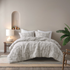 Ivory Cairo 3-piece cotton jacquard comforter set by Start2Finish, showing the elegant bedding with detailed patterns.