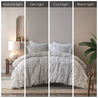 Ivory Cairo 3-piece cotton jacquard duvet bedding set by Start2Finish with intricate textured patterns on a bed.