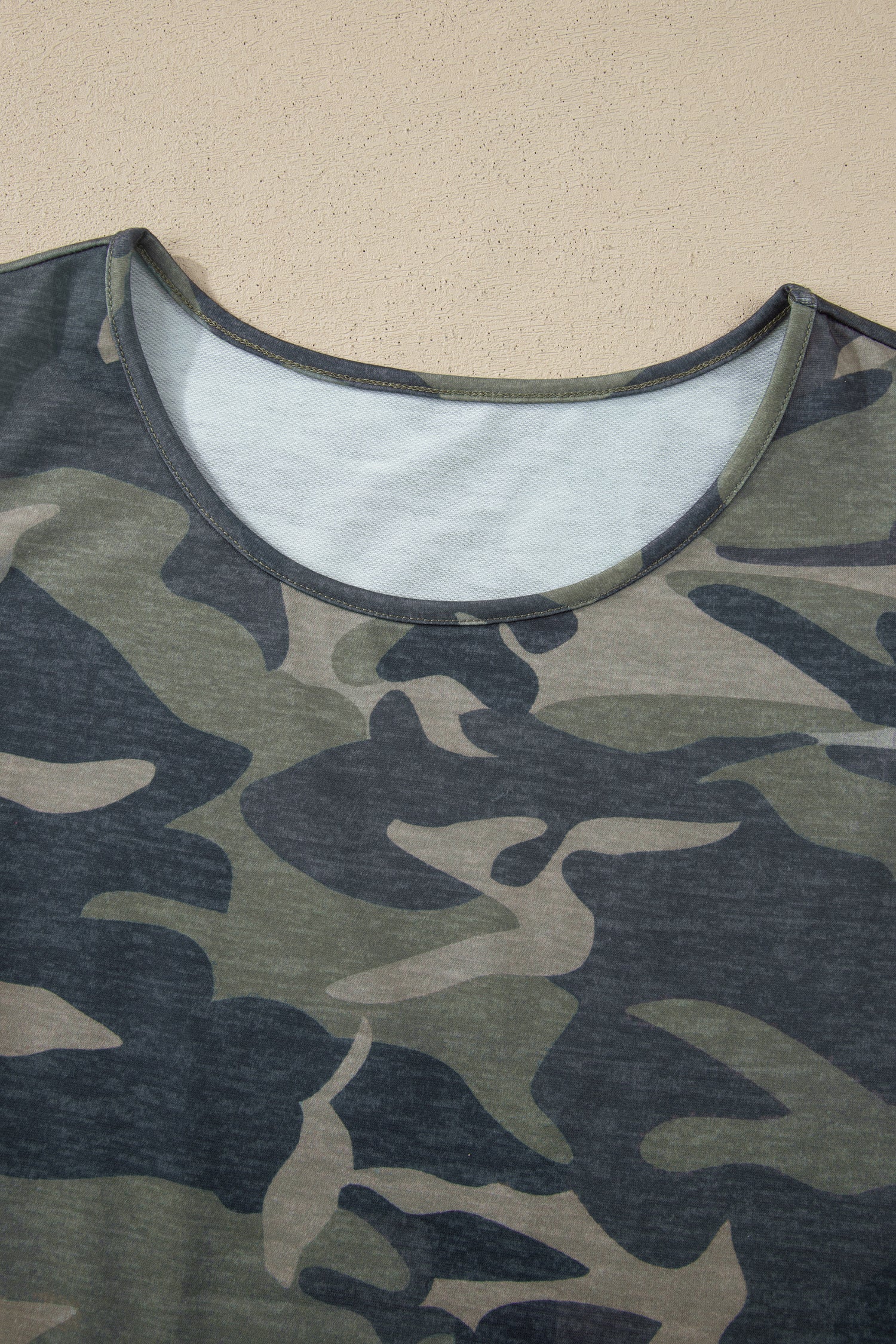 Women’s camo tank top and drawstring pant set by Byzantium Bay, featuring a stylish camouflage pattern and comfortable fit.