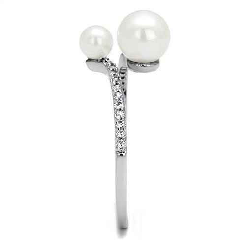 Rhodium brass ring with synthetic white pearl, jewelry piece by Turquoise Tiger featuring elegant design and shiny finish.