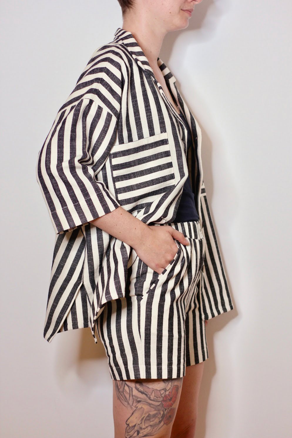 Black handwoven shirt from Blue Helios, stylish and breathable top with intricate weaving details.