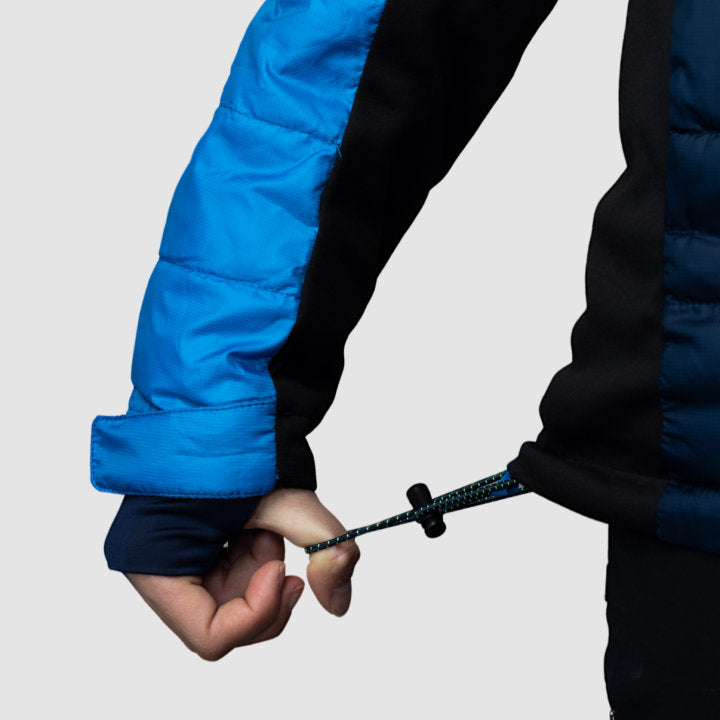 Women’s blue EcoDown jacket by Rose Hemera, activewear, showing front view with lightweight, insulated design and stylish fit.