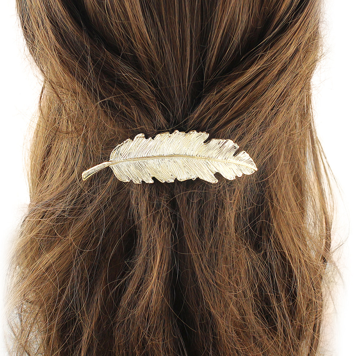 Gold and silver feather metal hair clips from White Demeter, decorative hair accessories with intricate feather design.