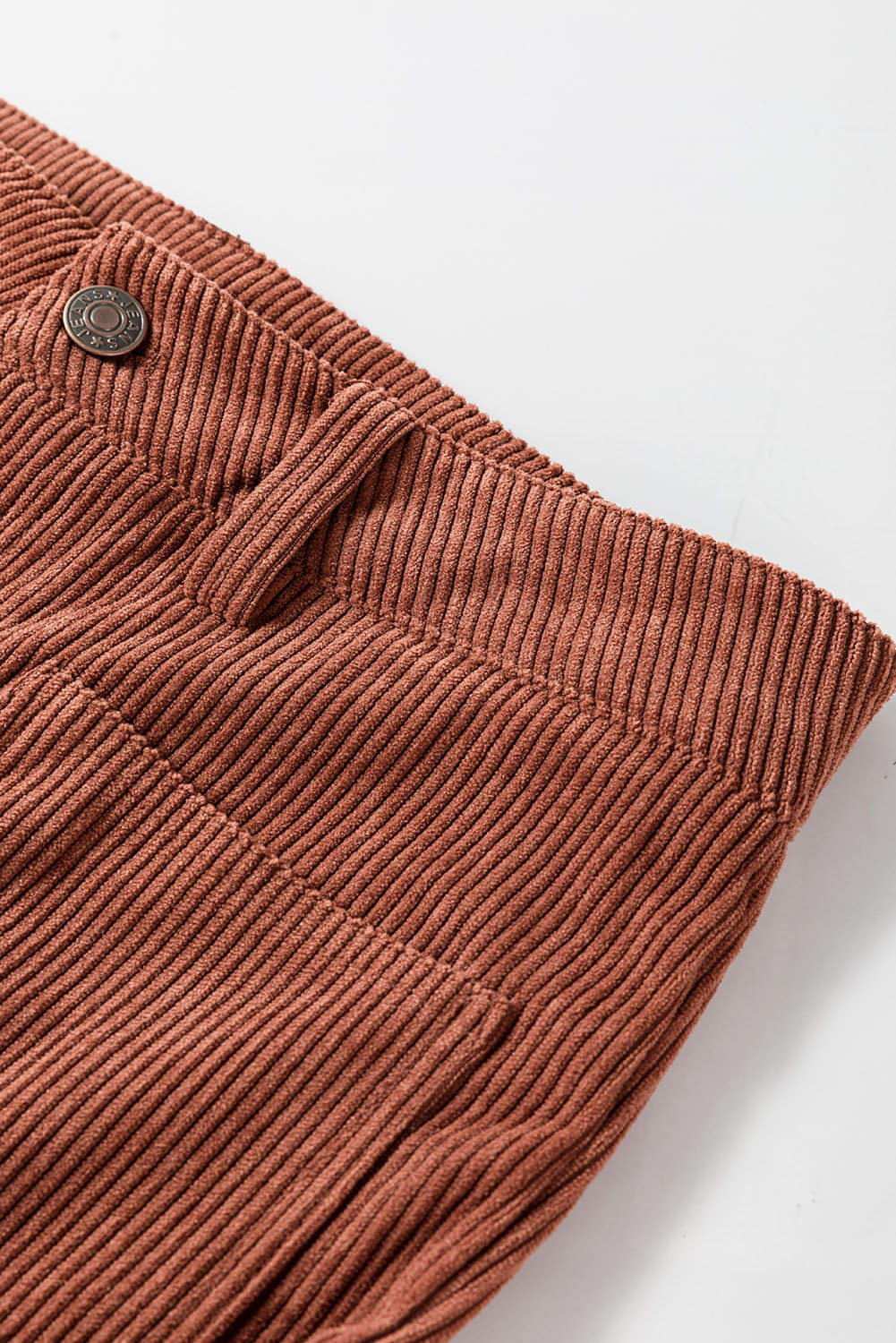 Carmine Juneberry brown high waist corduroy pants with square pockets, showcasing a stylish and comfortable pants design.