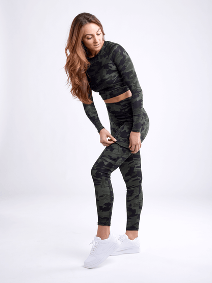 Black Lavender JupiterGear long-sleeve crop top, activewear for women, shown in a stylish black fabric with a fitted design.