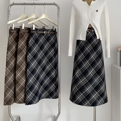High waist mid-length woolen plaid skirt for women by Carmine Juneberry, featuring classic pattern and tailored fit.