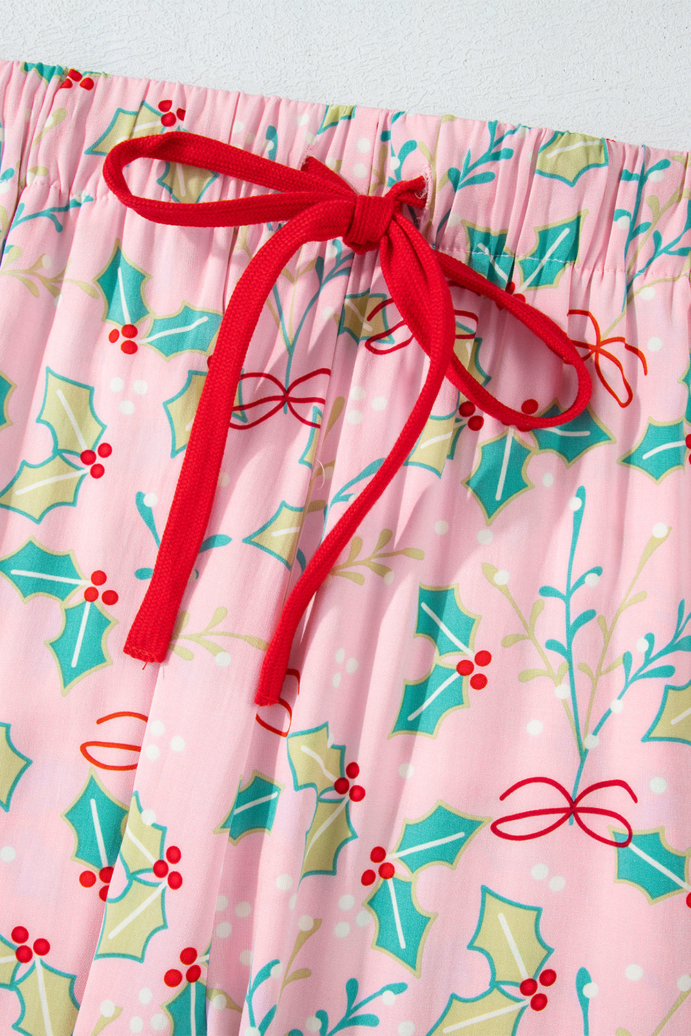 Byzantium Bay Christmas Holly top and shorts pajama set, festive matching sleepwear with holiday holly print and comfortable fit.