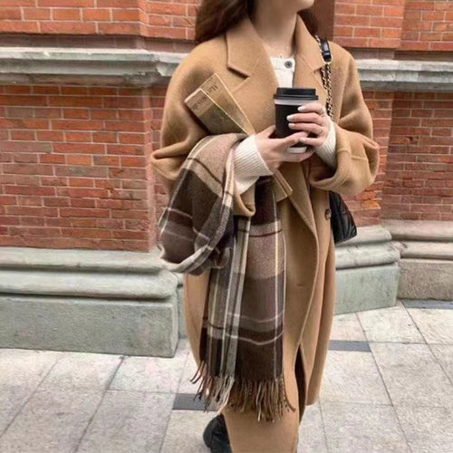 Small high-grade woolen coat for women by Pink Lucky, shown in a stylish, warm outerwear design on a neutral background.