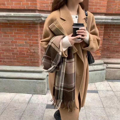 Small high-grade woolen coat for women by Pink Lucky, shown in a stylish, warm outerwear design on a neutral background.