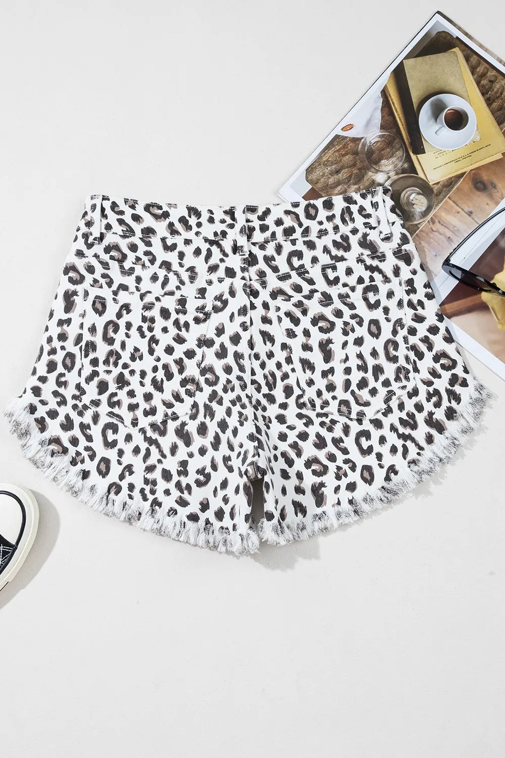 Leopard print frayed hem denim shorts for women by Ruby Styx, featuring a stylish distressed design and casual fit.