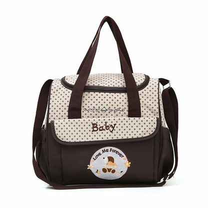 Mauve Thalassa diaper bag with personalized options, featuring multiple compartments and stylish design for parents on the go.
