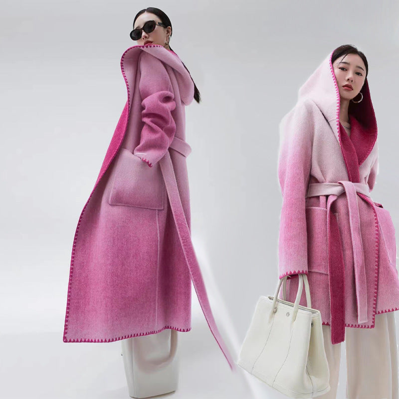 Women’s reversible cashmere coat by Carmine Juneberry, stylish and versatile jacket showing both outer and inner sides.
