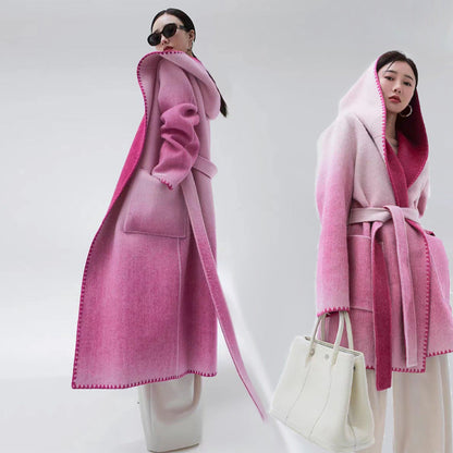Women’s reversible cashmere coat by Carmine Juneberry, stylish and versatile jacket showing both outer and inner sides.