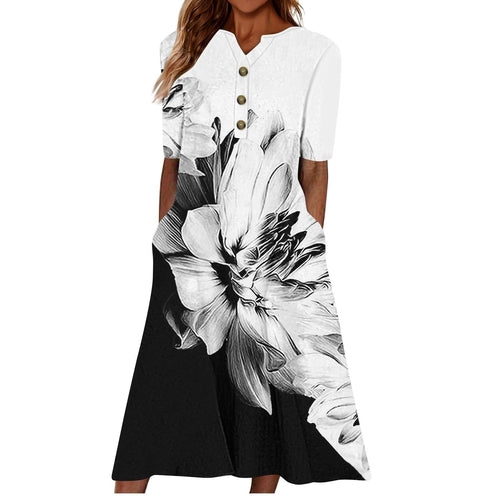 Women’s light summer midi dress by Carmine Juneberry featuring casual style, pocket details, and breezy fabric.