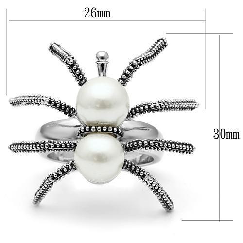 Rhodium brass ring by Turquoise Tiger with a synthetic white pearl, showcasing elegant jewelry design and craftsmanship.
