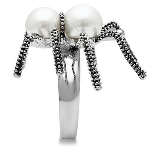 Rhodium brass ring with a synthetic white pearl, stylish jewelry piece from Turquoise Tiger, showcasing elegant design.