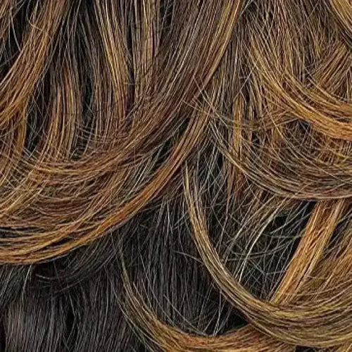 Peach Clymene Anita premium short human hair wig with loose curls in honey strawberry blonde and medium brown shades.
