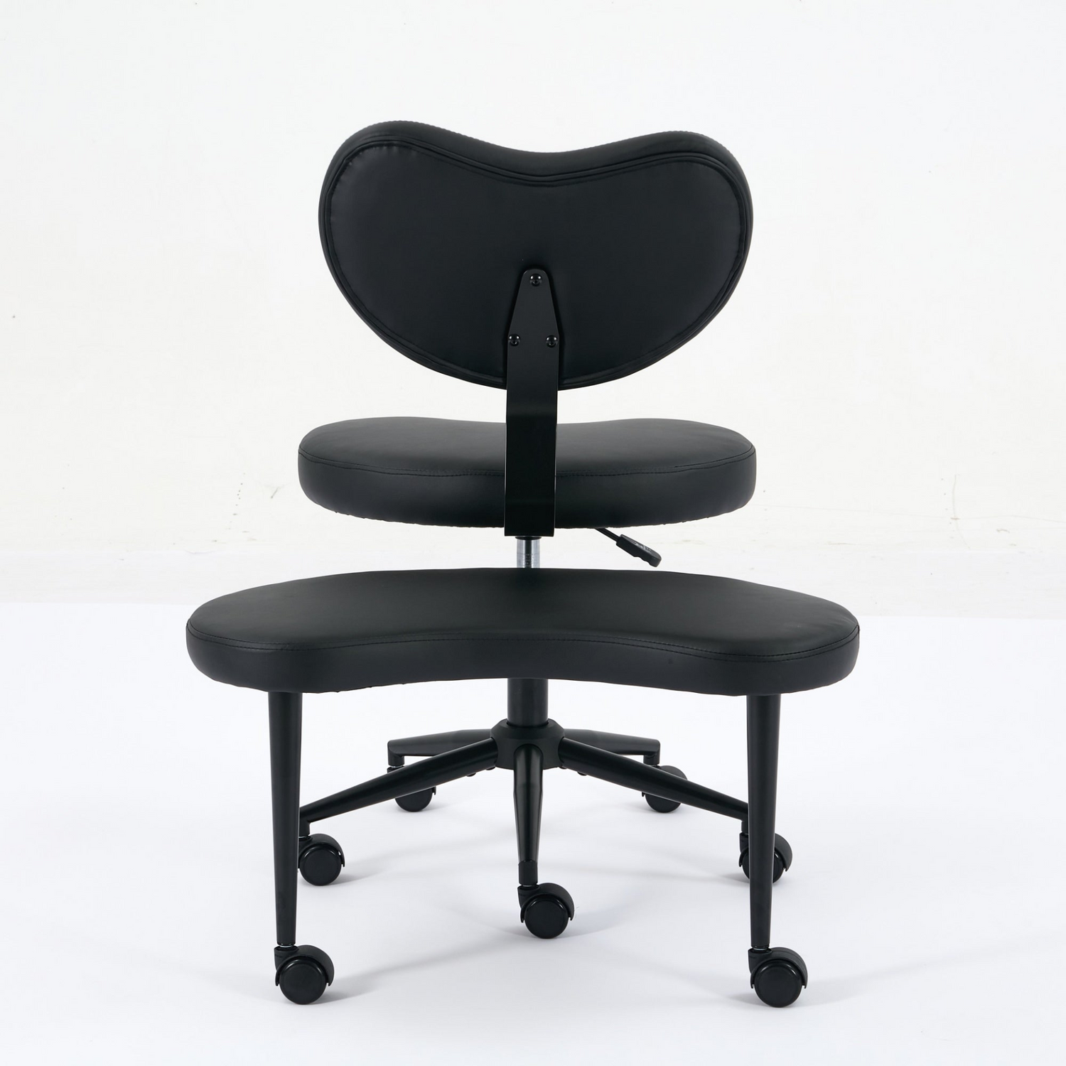 Black PU leather office chair with USB port, power access, and swivel function, suitable for home office or vanity desk.
