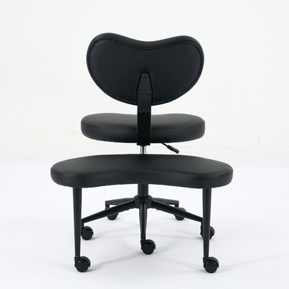 Black PU leather office chair with USB port, power access, and swivel function, suitable for home office or vanity desk.