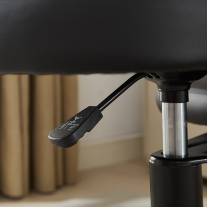 Black PU leather office chair with USB port, power access, and swivel function for home office or vanity desk.
