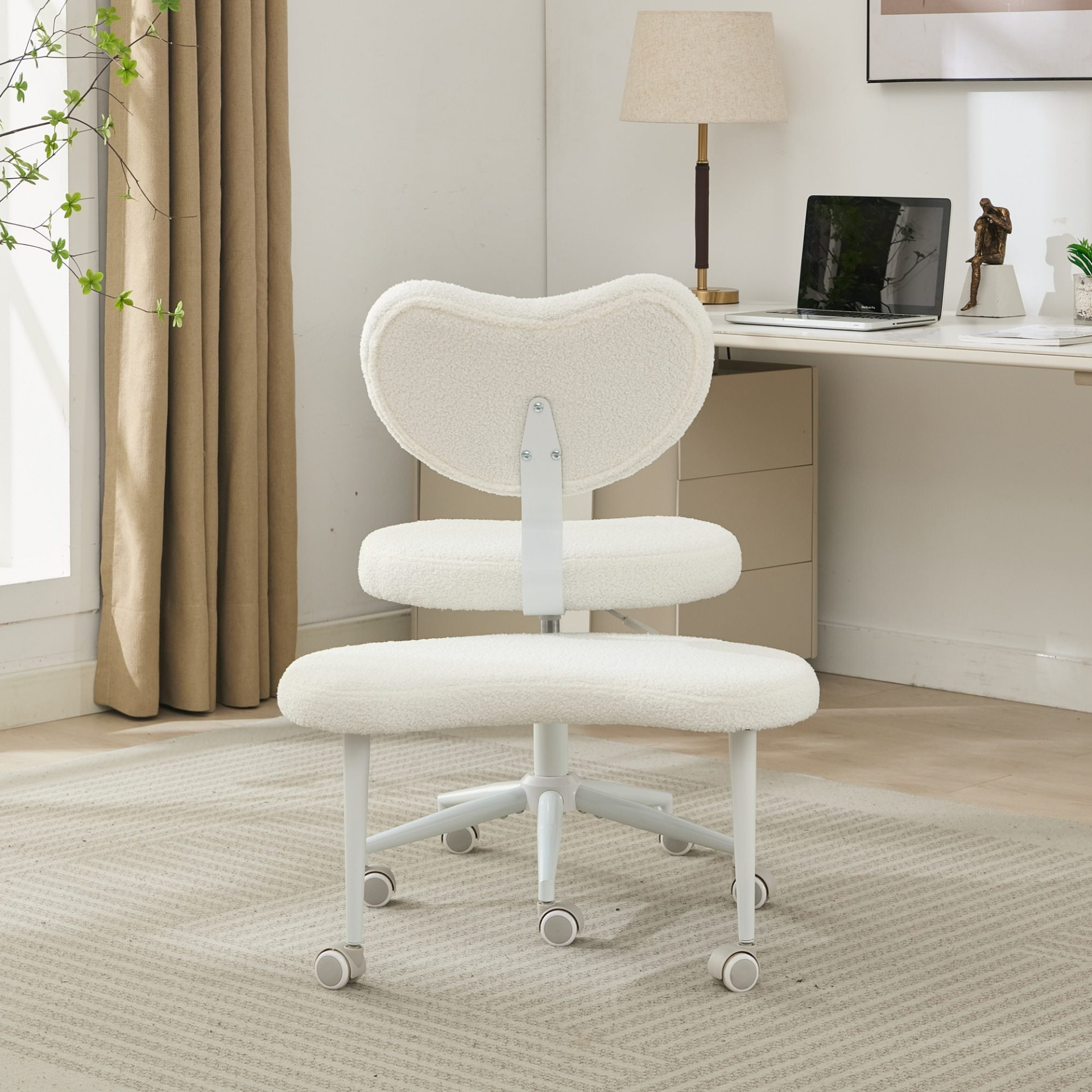 Black PU leather office chair with USB port, swivel base, and ergonomic design for home office or vanity desk setup.