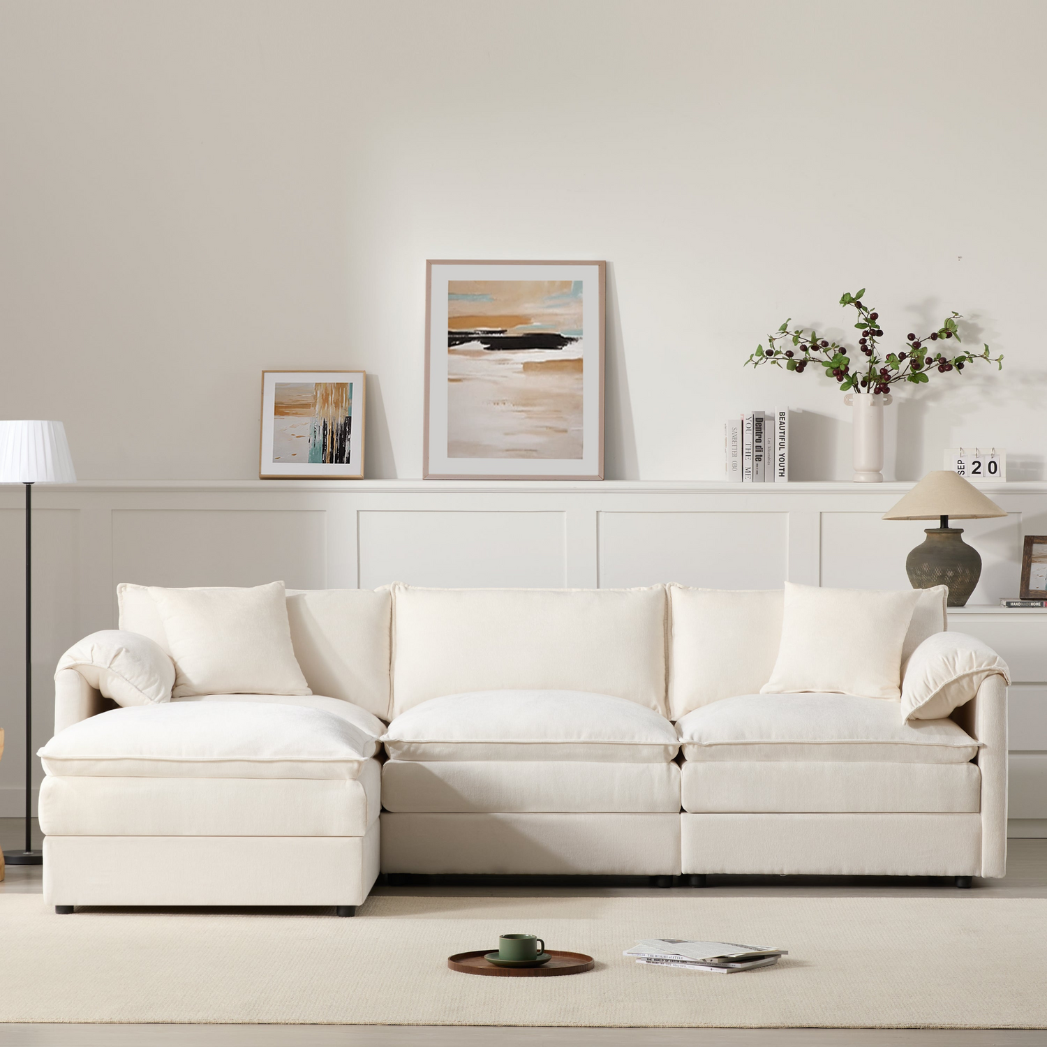 Cream and dark gray chenille sectional sofa with ottoman, modular design for living room and lounge by Start2Finish.