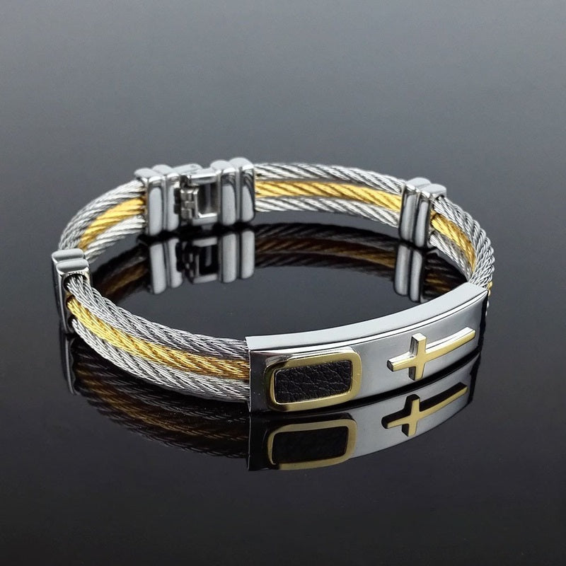Fuchsia Molly titanium wire bracelet with sleek, minimalist design featuring smooth, silver-toned titanium strands.