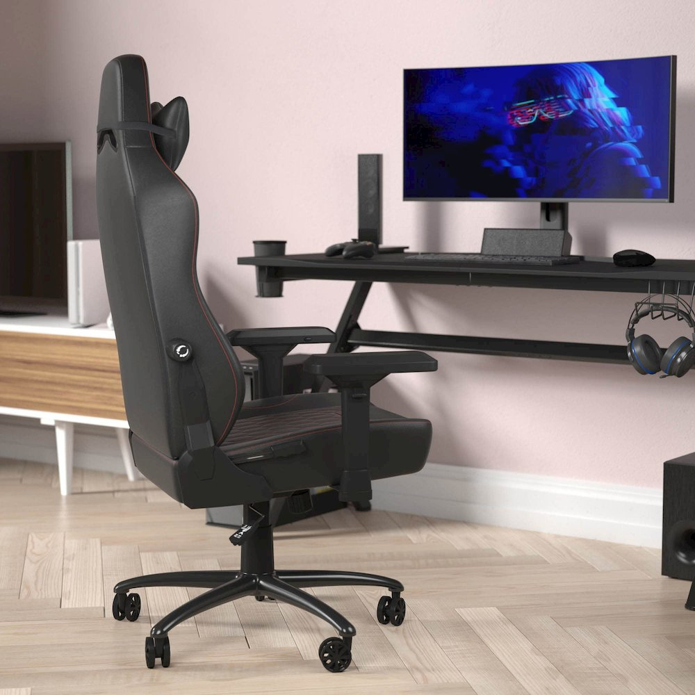 Black high back gaming chair with red stitching and 4D armrests, ergonomic furniture from Start2Finish.
