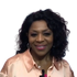 Curly black human hair wig with loose deep wave style, voluminous look, by Peach Clymene for haircare and styling.