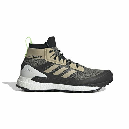 Black Adidas Terrex Free Hiker hiking boots for men, designed for camping and outdoor adventures, shown in a natural outdoor setting.