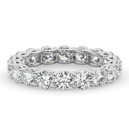 AGI Certified 2 CTW round lab-grown diamond eternity band in 14K white gold with F-VS clarity, featuring sparkling diamonds.