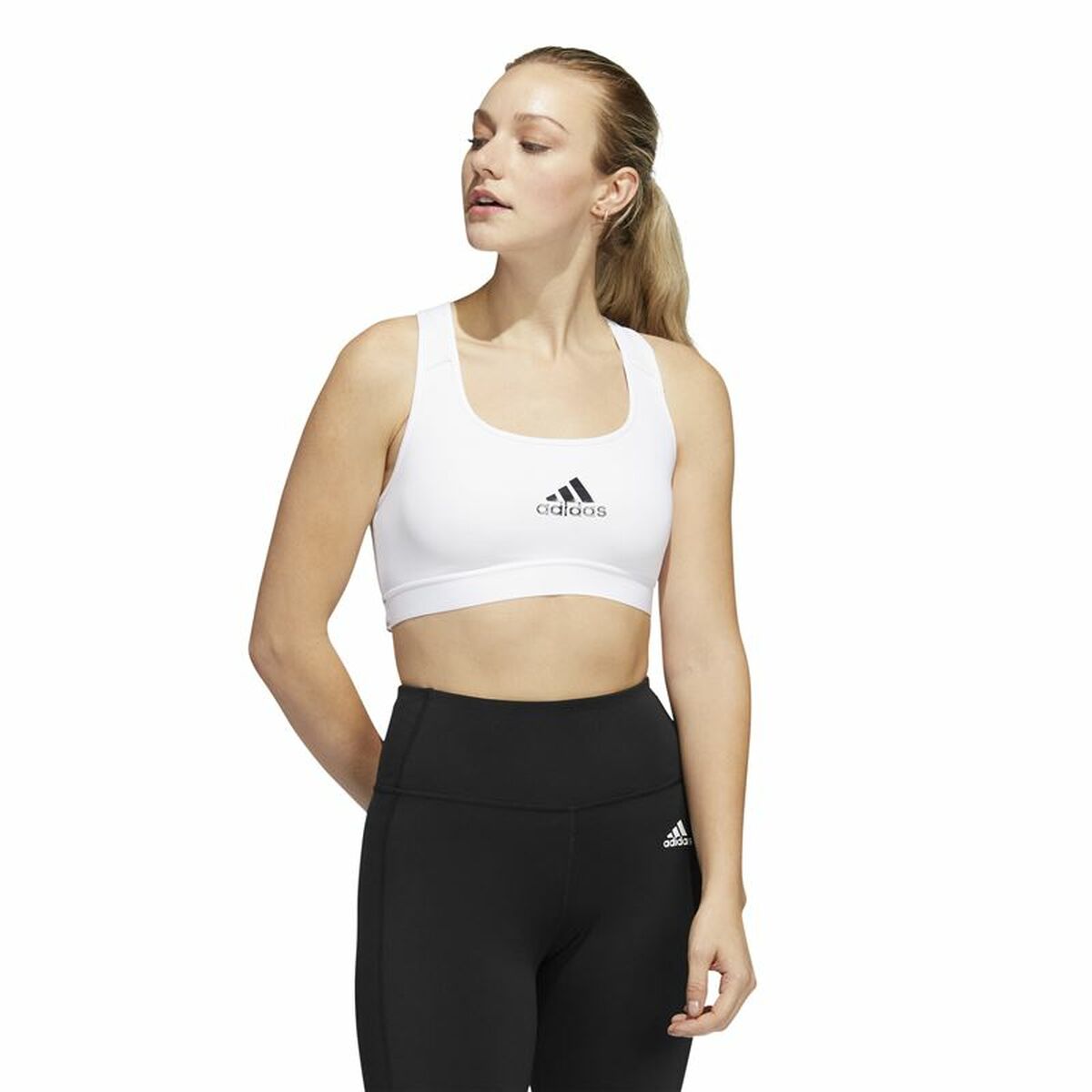 White Adidas PowerReact Training sports bra with supportive design, ideal for workout and active wear.