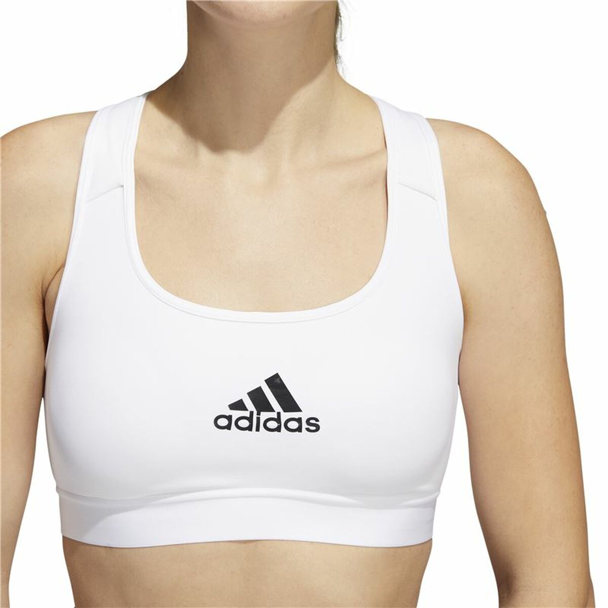 White Adidas PowerReact Training sports bra with supportive design, shown on a mannequin for activewear and fitness training.