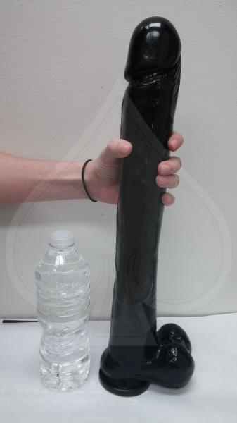 Black Exxxtreme Dong 16-inch adult toy with suction cup from Start2Finish, shown with textured surface and flexible design.