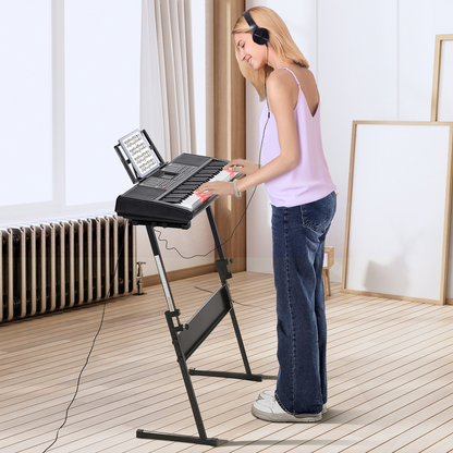 Start2Finish VEVOR 61-key digital keyboard piano with lighted keys, adjustable stand, built-in speakers, and headphone jack.