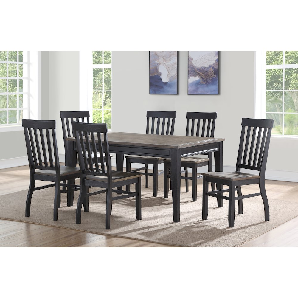 Start2Finish Raven Noir dining table with a sleek black finish and modern design, shown in a well-lit room setting.