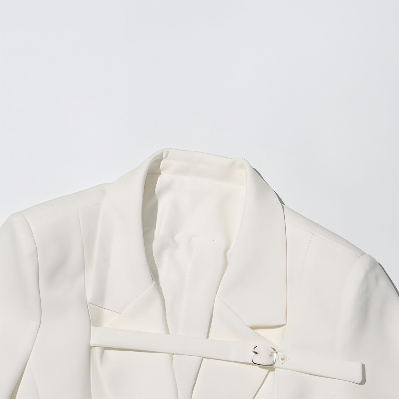 Women’s slim fit patchwork suit jacket by Carmine Juneberry, stylish and tailored, shown in a modern fashion design.