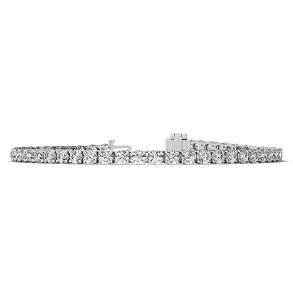Lab created Moissanite tennis bracelet with 3mm stones in white or 14K gold plated finish, featuring a delicate and elegant design.