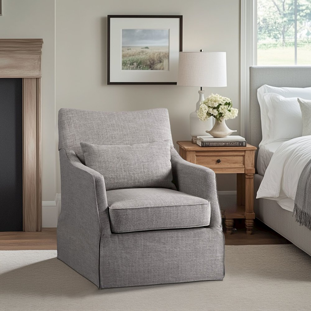 Start2Finish skirted swivel chair with cushioned seat and fabric covering, shown from a side angle in a modern office setting.
