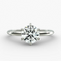 Round lab-grown diamond solitaire engagement ring with six prongs, F-VS clarity, set in 14K white gold.