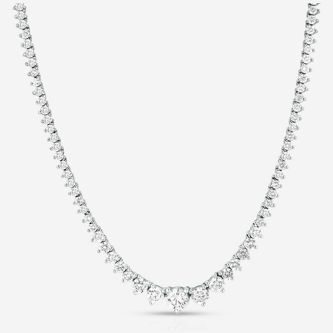 Created Moissanite tennis necklace with 15 carats, G-H color, SI clarity, featuring graduated round stones on a silver chain.