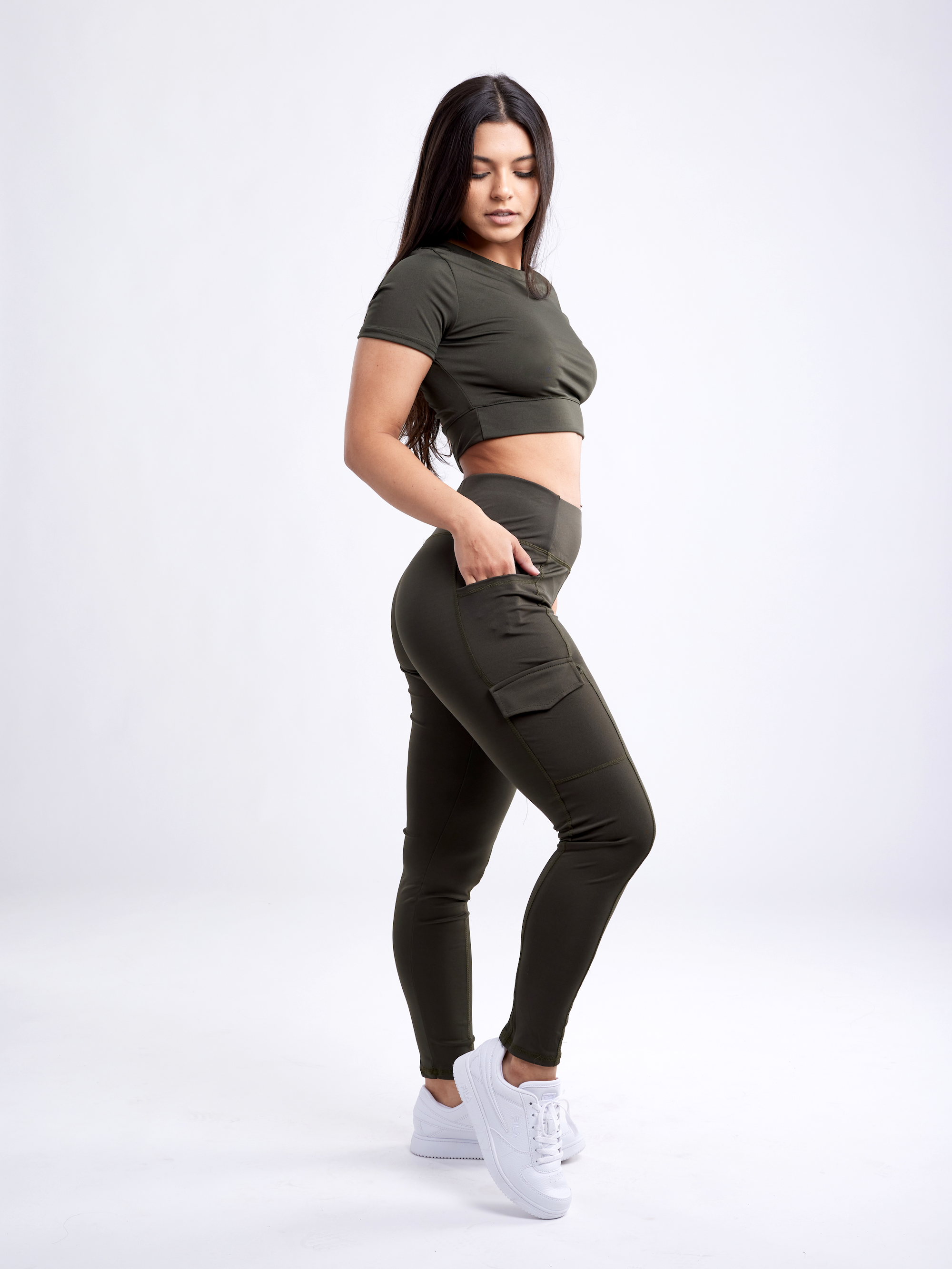 Sky Iapetus JupiterGear short-sleeve crop top for activewear, featuring a fitted design and breathable fabric, shown on a model.