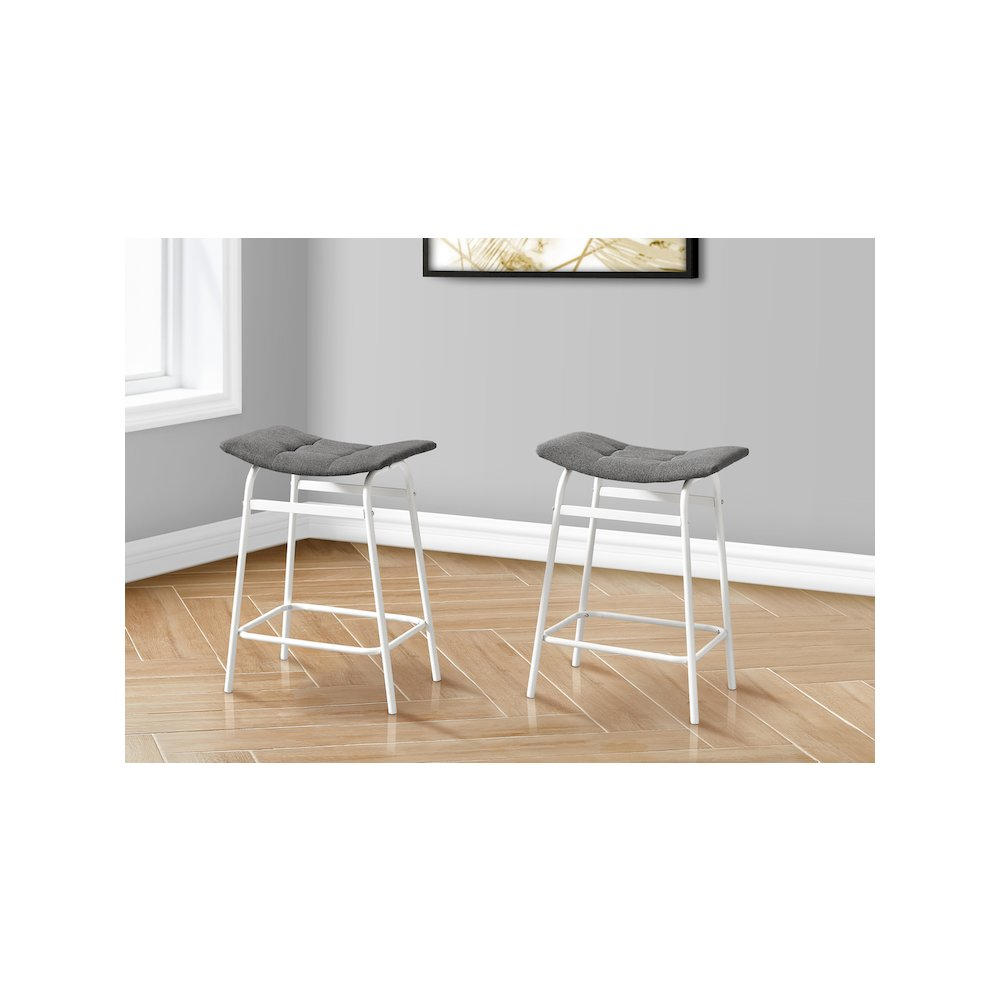 Set of two counter height barstools by Start2Finish with wooden legs and cushioned seats, perfect for kitchen or bar area.