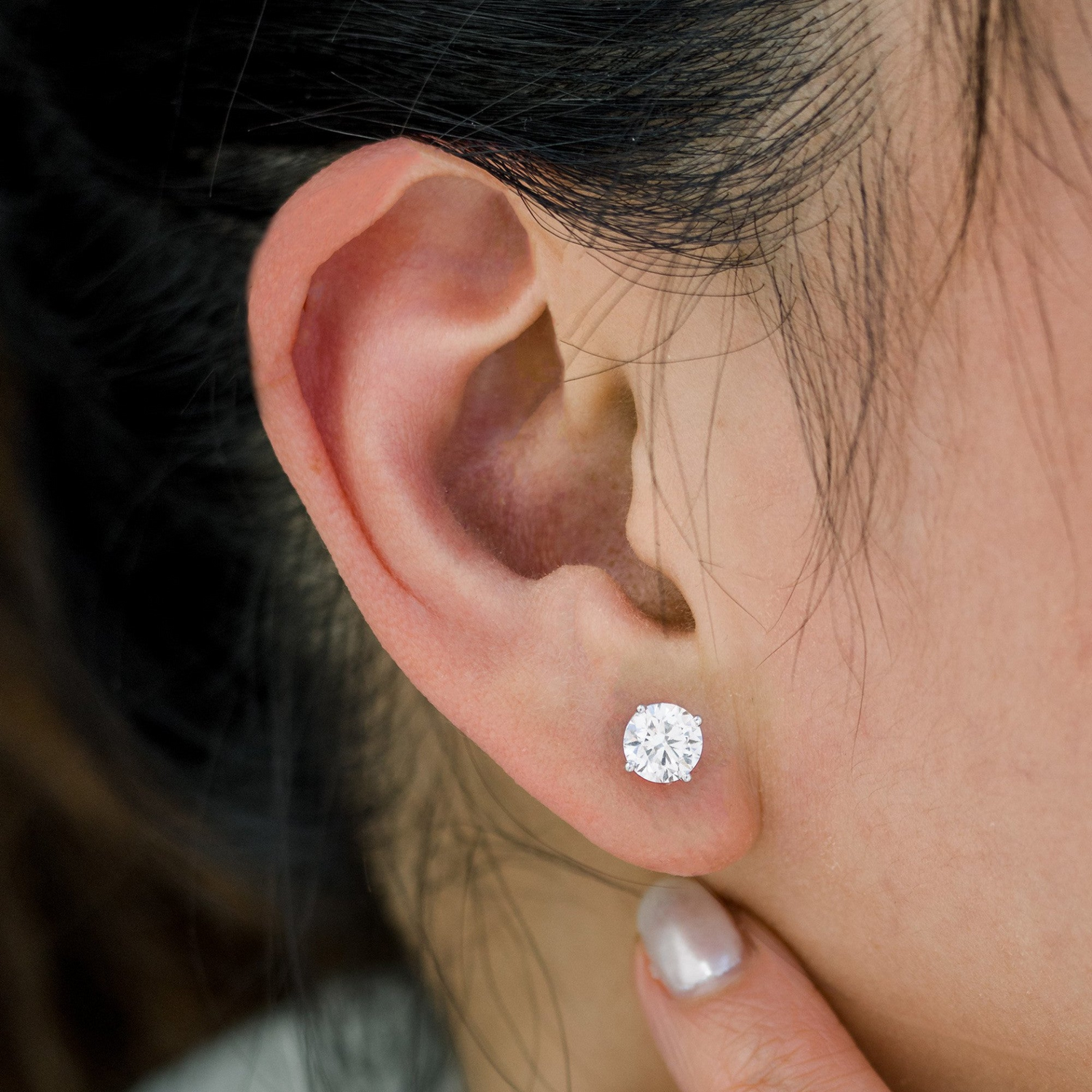 Start2Finish 2.50 CTW AGI Certified Lab-Grown Diamond Stud Earrings in 14K Yellow Gold with G color, VS clarity, round cut.