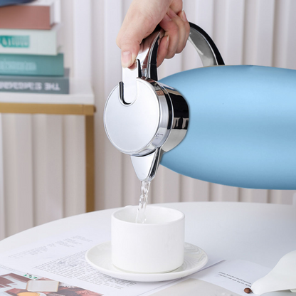 Blue Start2Finish Soga 0.48-gallon insulated vacuum flask for home use, showing the sleek blue exterior and secure lid.